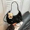 Bolsa de Dumpling Suede Retrô Estilo Coreano Ins2025 Outono Novo Simples Bolsa de Mão para Viagem com Laço Bolsa de Ombro Única