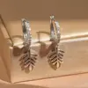 Lote mixto de varios estilos aretes de oro para mujer con colgante geométrico de circón microincrustado joyería de oreja de nicho de alta gama