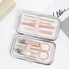 Juego de belleza de cortaúñas de 7 piezas color oro rosa juego completo de cortaúñas set de herramientas de manicura Portátil