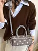 Bolso de axila de lunares estilo coreano de nicho para mujer, nuevo de moda otoño 2026, versátil, de alta gama, para ir al trabajo, de hombro y cruzado