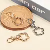 Clip de perro de aleación de zinc, Anilla de resorte de flor de ciruelo, Gancho giratorio chapado, Anilla de resorte de forma especial, Gancho de hardware para accesorios de muñeca