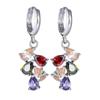 Pendientes de moda coloridos Qingxing Mona Lisa pendientes cobre incrustación color AAA circonita cruz fuente transfronteriza pendientes