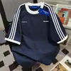 Camiseta Trendy de Estilo Coreano con Bloques de Color, Cuello Redondo y Manga Corta para Hombres y Mujeres, Popular de Verano de Corte Holgado para Parejas de Estudiantes Japoneses y Coreanos