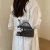 Bolso de nicho súper popular para mujer, nuevo bolso cruzado casual versátil de verano 2026, bolso cuadrado pequeño elegante y chic
