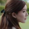 Deixe-me Brilhar: Laço de Cabelo Estilo Ballet com Fitas de Zhao Lusi e Xu Yan