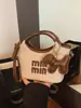 2026 Nuevo Diseño de Nicho Bolso de Axila con Letras Versátil Bolso de Lujo Ligero Estilo Miu Bolso Cubo Bolso de Hombro Único Cruzado