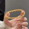 Popular Nuevo Pulsera Rosa Estilo Chino Imitación Piedra Solar, Aspecto de Alta Gama, Dulce y Apilable, Pulsera de Perlas Ojo de Gato de Lujo Ligero