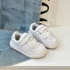 Zapatillas de moda para niños 2026 primavera y otoño unisex con velcro zapatos casuales para niños mayores zapatillas blancas versátiles