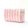 Nueva Bolsa de Cosméticos de Gran Capacidad para Viajes Transfronterizos, Bolsa para Productos de Cuidado de la Piel, Diseño Portátil, Bolsa para Guardar Labiales, Bolsa Rayada para Mujer