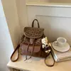 Mochila feminina de grande capacidade transfronteiriça 2026 nova moda retrô bolsa de viagem escolar estilo faculdade mochila para o dia a dia