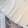 Otoño 2025 Nuevo Estilo Minimalista Rayas Blancas y Negras Moderno Elegante Diseño Lujo Ligero Suéter de Punto de Manga Larga para Mujer