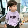 Camiseta de manga larga para niño, nuevo modelo otoño 2026, playera básica de algodón puro para niños, top estiloso para niños, dos piezas para primavera y otoño