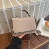 Bolsos de Moda de Este Año 2026 Verano Nuevo Estilo Coreano Moda Remache Personalidad Cadena Cruzada para Mujer Bolso Cuadrado Pequeño