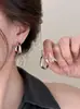 Pendientes de Aro Irregulares Lisos de Metal 2025 Nuevo Popular Diseño de Nicho Pendientes de Temperamento de Gama Alta Pendientes de Botón