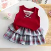 Conjunto Elegante de Verano para Niñas: Chaleco sin mangas rojo retro con lazo y falda plisada a cuadros de varios niveles, conjunto de dos piezas estilo coreano