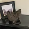 Bolso bandolera tipo dumpling con estampado de leopardo para mujer, nuevo y moderno 2026, bolso de hombro de nicho súper popular para otoño, bolsa de gran capacidad para el día a día