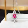 Colgante de topacio rosa explosiones naturales plata S925 decoración femenina piedra principal 5*7mm cruz caliente transfronterizo una generación de cabello