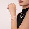 Pulsera Duoduo de Arroz Estilo Ins Europeo y Americano Acero Inoxidable Hecha a Mano Incrustada Flor de Ciruelo de Circonita para Mujer Lujo Ligero para el Trabajo Chapado en Oro de 18k