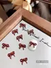 Acessórios de Nail Art Vinho, Laços de Pérola, Flores de Coração Torto, Decorações de Unha Versáteis de Resina com Strass de Luxo Leve Atacado