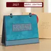 Calendario 2027 Estilo Chino Estampado en Caliente Calendario Mensual Adorno de Escritorio Creativo Anillado Tarjeta Perforada Planifica el Calendario de Hoy Logo Personalizado