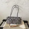 Bolsa de ombro feminina com design de nicho transfronteiriço estilo ins de bolinhas para axila, nova moda outono 2026 estilo coreano para o dia a dia