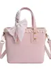 Bolsa Quadrada Pequena Xadrez com Laço Rosa Feminina 2026 Nova Chegada Primavera Estilo Coreano de Nicho Moda Versátil Bolsa de Ombro Único Transversal