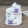 Zapatos Nuevos de Primavera y Otoño 2026 para Niños Pequeños, Niñas y Niños, Tenis Blancos de Cuero de Moda con Dibujos Animados de Caña Media