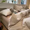 Juego de ropa de cama minimalista de cuatro piezas con rayas y cuadros mixtos, sábana y funda de edredón de algodón puro, juego de tres piezas para dormitorio de estudiante