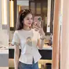Camiseta blanca de manga corta estilo chino con tapeta de botones y abertura para mujer, nuevo modelo de verano con mangas de herradura, corte ajustado y top de moda