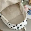 Mochila de estilo coreano con lunares y un fresco dije de tulipán, una bolsa escolar de gran capacidad, una mochila versátil y casual para estudiantes