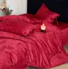Conjunto de quatro peças de algodão de fibra longa Xinjiang 100S, apresentando um design luxuoso e de alta qualidade, feito de algodão puro com alta contagem de fios, e uma fronha de edredom com padrão jacquard adequada para todas as estações