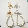 Nova Pulseira Criativa de Pérola Amor Pingente Chaveiro Pingente de Concha Acessórios de Pérola Celebrante da Internet Pequenas Joias em estoque