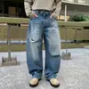 Jeans nuevos y elegantes para hombre con un diseño de alta gama desgastado, efecto adelgazante, versátiles, estilo nicho, pierna ancha, pantalones largos lavados