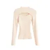 Camiseta básica de cuello medio alto negra para mujer, nuevo estilo otoño 2026, suéter de punto interior sexy y elegante con diseño hueco de alta gama