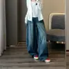 Pantalones de pierna ancha de nuevo diseño para principios de otoño, alto contenido, silueta holgada, jeans de mezclilla lavada versátiles de cintura alta adelgazantes para mujer H081808