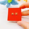 Pendientes de girasol chapados en oro de temperamento para mujer, moda, estrellas frescas, nicho, joyería para orejas de alta gama, fabricantes de origen, venta al por mayor