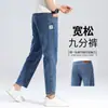 Jeans azules ligeros de alta gama italianos de verano para hombre, corte recto holgado, elásticos, adecuados para uso de negocios y casual.