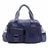 Bolsa de Viaje Transfronteriza para Mujer 2026 Nuevo Estilo Retro Casual Tela de Nylon Moda Simple Ligera Bolso Cruzado para Hombro