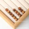 Pulsera de Cuentas Sueltas de Nanmu Dorado Natural Accesorios de Cuentas Cuentas de Buda Cuentas Retorcidas a Mano Juguetes de Madera Cuentas Redondas de Nanmu Dorado
