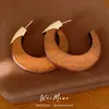 Pendientes de madera de aguja plateada en forma de C, estilo retro francés, elegantes y con estilo, pendientes únicos, sensación de lujo ligero y alta gama, venta al por mayor