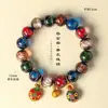 O Ponto Turístico Especializa-se em Oferecer Pulseiras de Vidro Esmaltado Cinza para Homens e Mulheres, Contas de Besta Dourada que Engole Tesouros Múltiplos, Contas Budistas e Enfeites Culturais e Criativos para Barracas de Templo