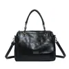 Bolsa Boston Feminina 2026 Novo Estilo Bolsa de Ombro Único Bolsa Feminina Moda Europeia Americana Bolsa de Mão em Couro Macio Versátil Bolsa Transversal Tendência