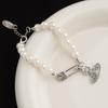 Pulsera de Pines Saturno Perla Versátil de Lujo Ligero para Mujer, Nueva Joyería Exquisita de Alta Gama con Sentido de Diseño Nicho de Lujo Ligero Europeo y Americano