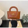 Bolso versátil de rombos de diamantes de alto valor transfronterizo bolso pequeño para mujer nueva moda cadena de lujo ligero bolso de un solo hombro cruzado de cuerpo bolso moderno