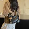 Bolso de hombro simple y versátil, nuevo bolso cruzado de moda 2026 para el día a día, gran capacidad, color liso, bolso de hombro de lujo ligero para debajo del brazo