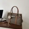 Bolso de mano de lujo ligero de nicho para comercio exterior para mujer, nuevo, estilo retro para el trabajo, para el día a día, de un solo hombro, cruzado