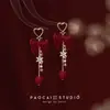 Pendientes de Perlas con Lazo Rojo para Otoño e Invierno para Mujer, Pendientes de Alta Gama, Nuevos Pendientes Rojos Estilo Chino 2025