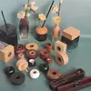 Venta al por mayor del fabricante Tapa asimétrica de 28 dientes para botella de perfume Botella de vidrio Tapa de madera Tapa de madera para perfume de aromaterapia de ratán sin llama