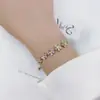 Pulsera con Diseño de Pétalo Micro-Pavimentada con Circonita Chapada en Oro Real de 14K Estilo Coreano Popular Estilo Genial Simple Pulsera para Mejor Amiga