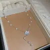Collar de Perlas con Lazo de Flores y Corazón Estilo Europeo y Americano, Cadena Clavicular Elegante de Nicho, Collar de Lujo Ligero de Moda de Gama Alta para Mujer